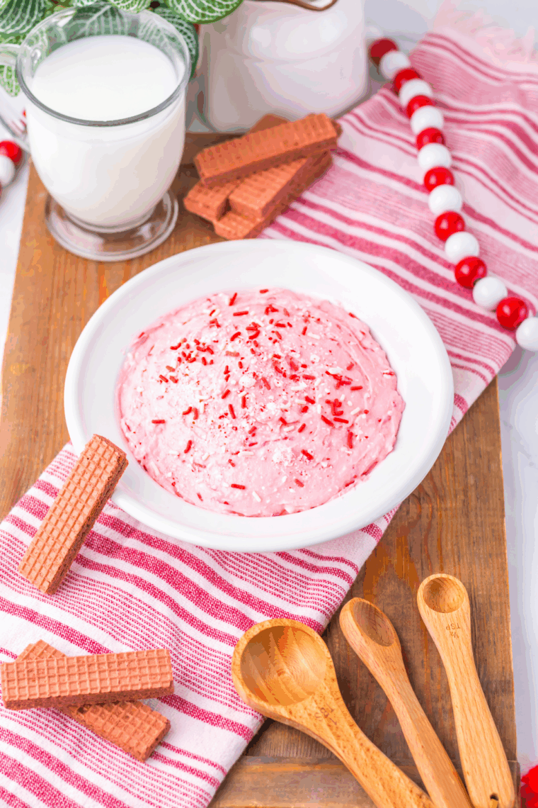 Bowl of Easy 2-Minute Peppermint Fluff topped with crushed candy canes.