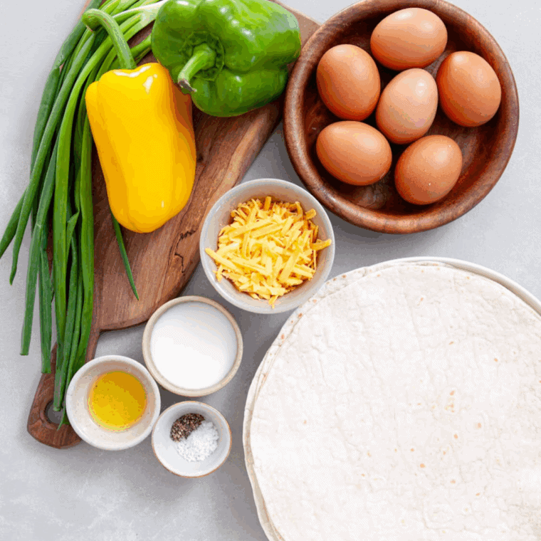 Ingredients needed for Easy Copycat SuperSonic Breakfast Burrito on kitchen table.