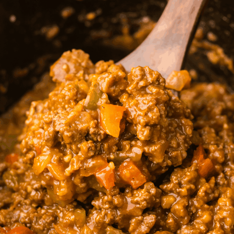 Sloppy Joe mixture served on slider buns with cheddar cheese and pickles