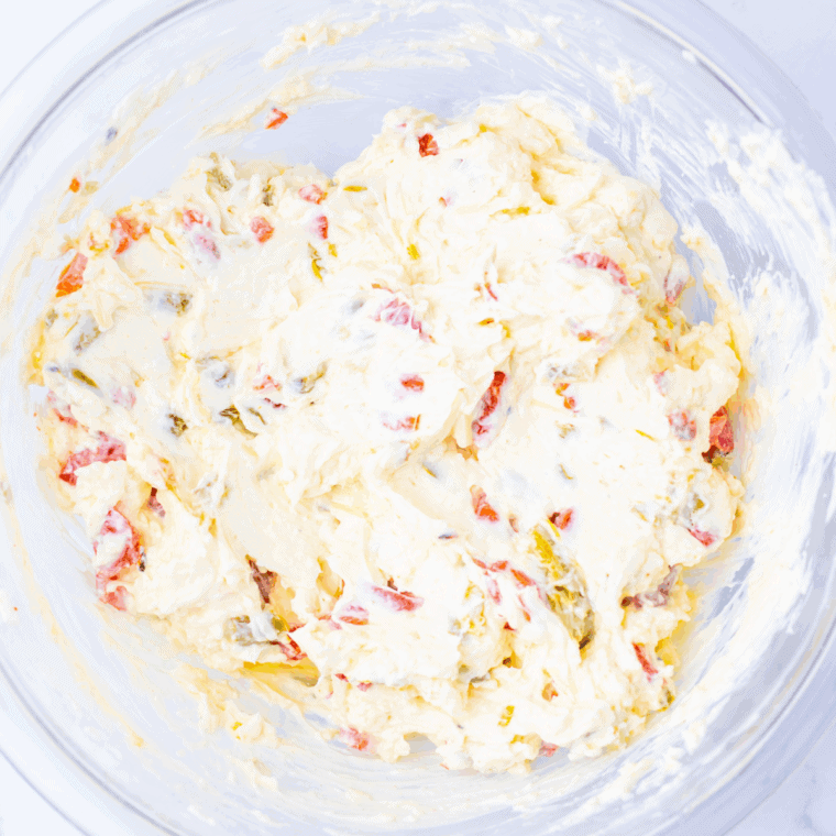 Easy Texas Christmas Dip served chilled with crackers, chips, and fresh vegetables.