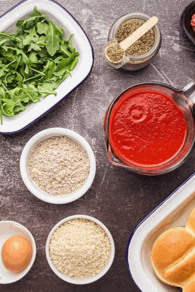 Ingredients needed for Slow Cooker Marinara Sauce on kitchen table.