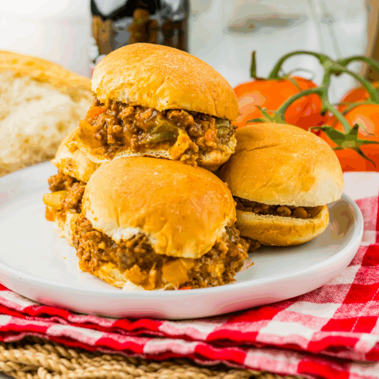 Mini Slow Cooker Root Beer Sloppy Joe Sliders on buns with juicy, saucy beef filling, ready to serve.