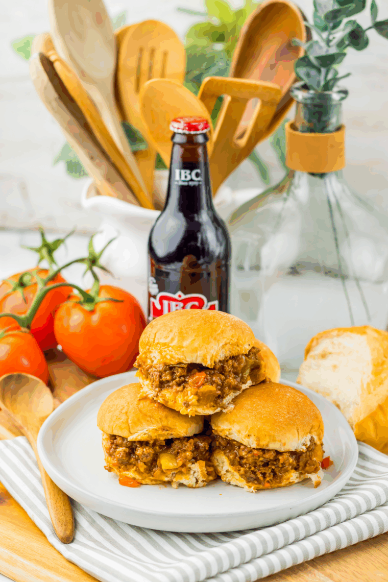 Slow Cooker Root Beer Sloppy Joes on slider buns with juicy, saucy beef filling, ready to serve.
