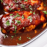 Slow Cooker Sweet Baby Ray’s Chicken cooked until tender and coated in thick, glossy barbecue sauce.