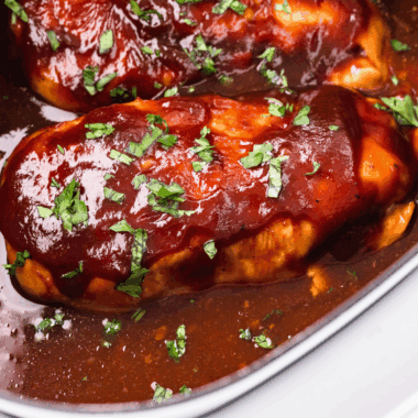 Slow Cooker Sweet Baby Ray’s Chicken cooked until tender and coated in thick, glossy barbecue sauce.