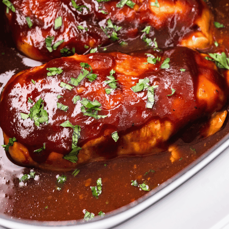 Slow Cooker Sweet Baby Ray’s Chicken cooked until tender and coated in thick, glossy barbecue sauce.