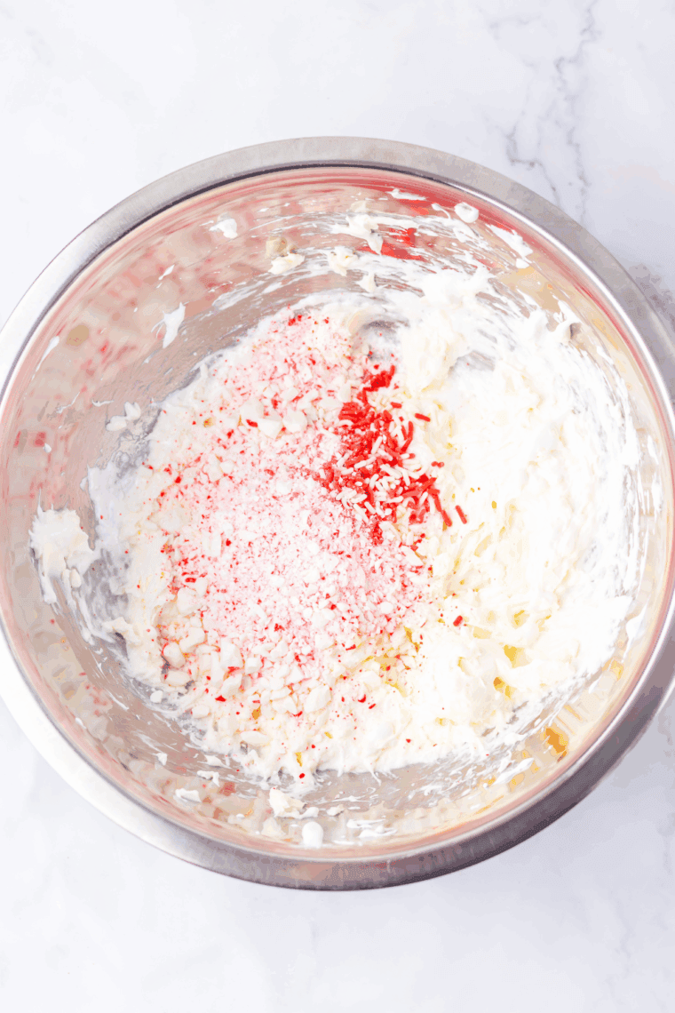Adding crushed peppermints and red food coloring to Valentine&rsquo;s Day fluff