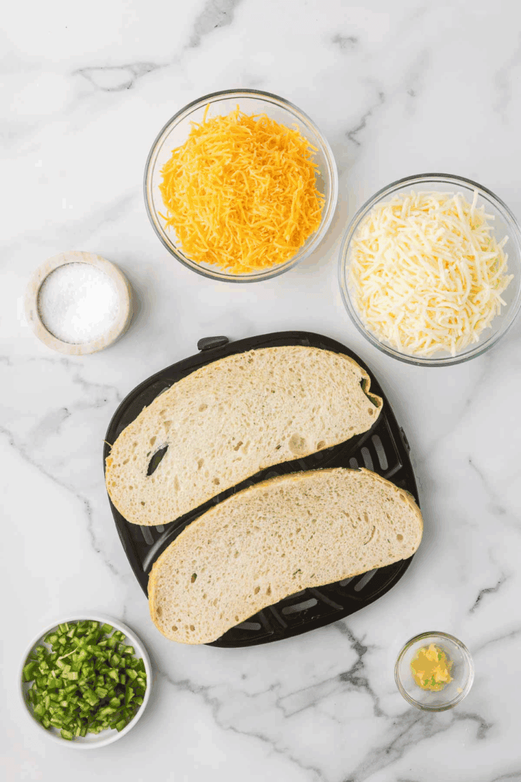 Prep the Bread: Lightly buttered bread slices sprinkled with garlic powder, salt, and pepper