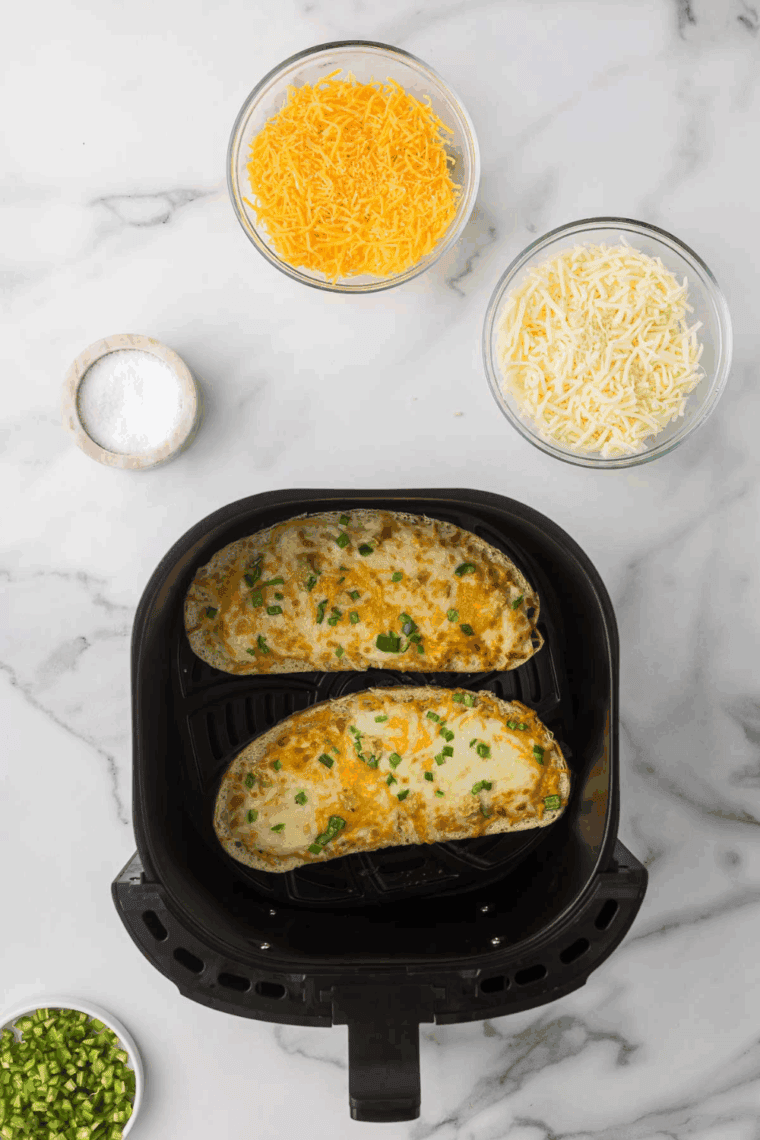 Golden, melted cheese on toast served warm on a plate
