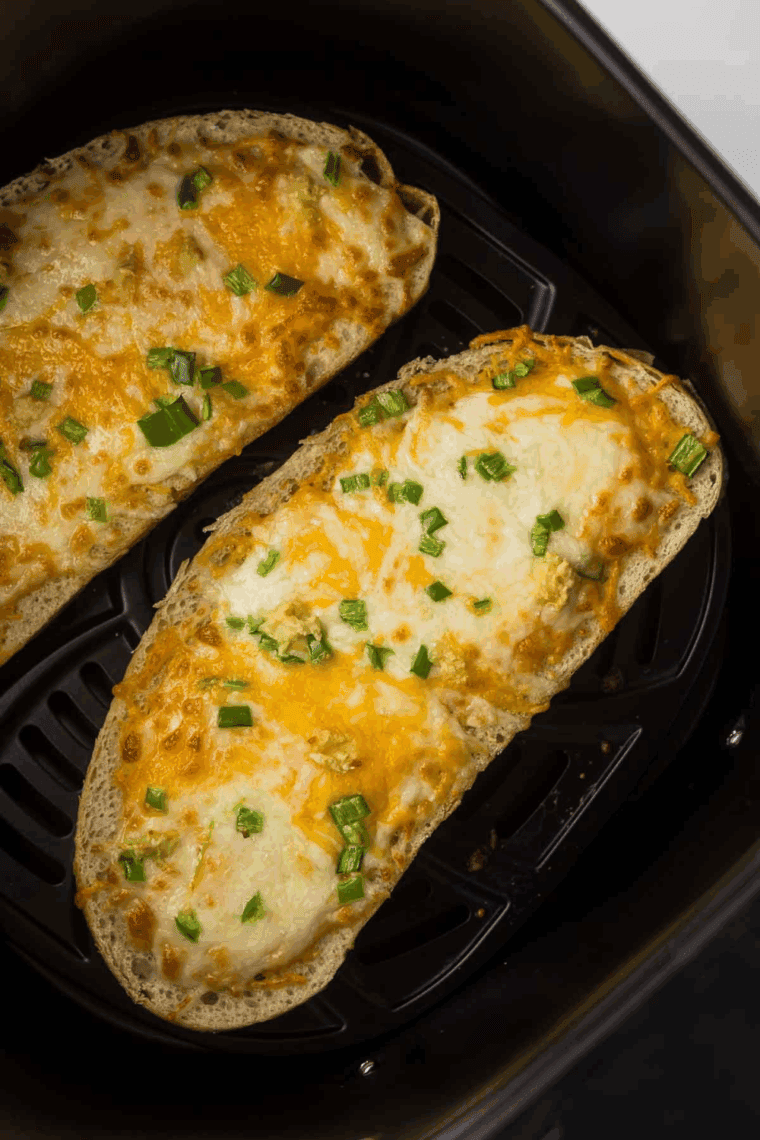 Golden, crispy air fryer cheese on toast with melted, bubbly cheese