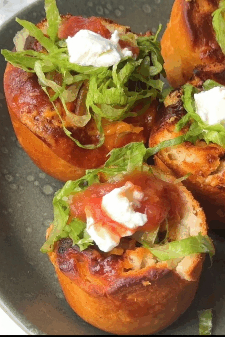 Golden air fryer taco bites filled with seasoned beef and melted cheese