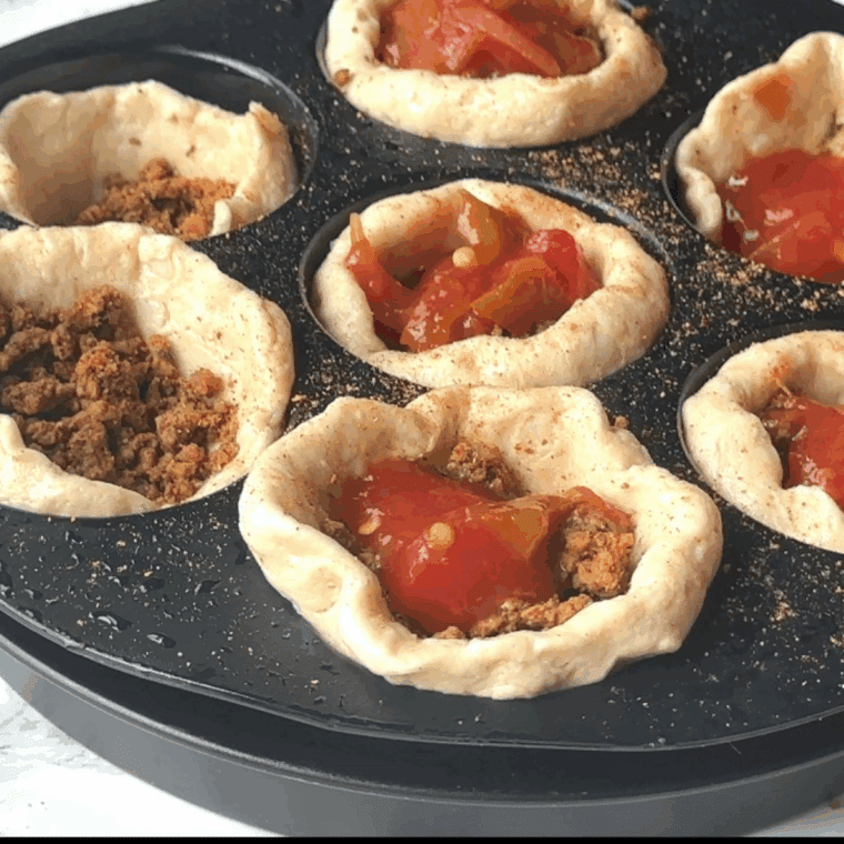 Add salsa on top of the taco meat.