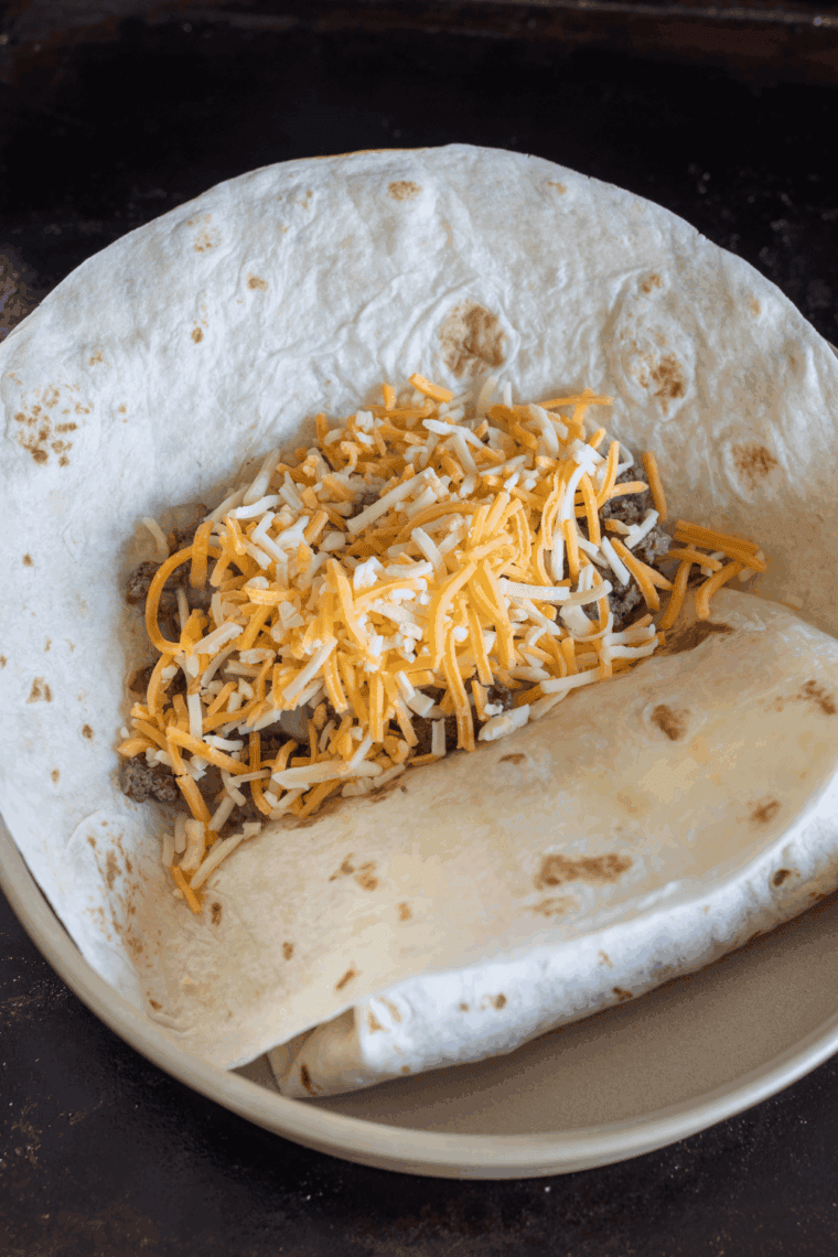 Savory Blackstone Griddle Taco Meat sizzling on a hot griddle, ready to serve.