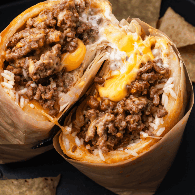 Juicy Blackstone Griddle Taco Meat sizzling on the griddle, ready to serve.