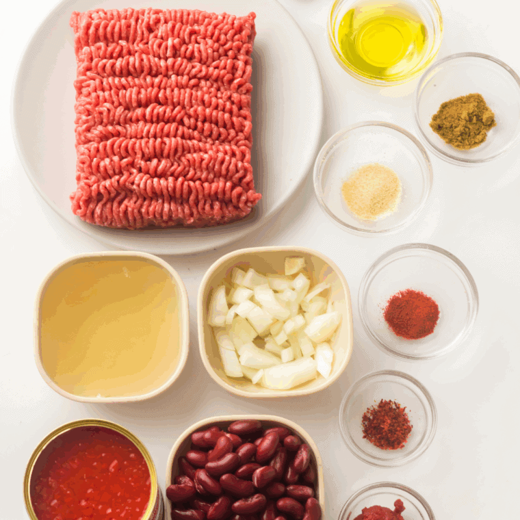Ingredients needed for Culver's George's Chili Copycat Recipe on kitchen table.