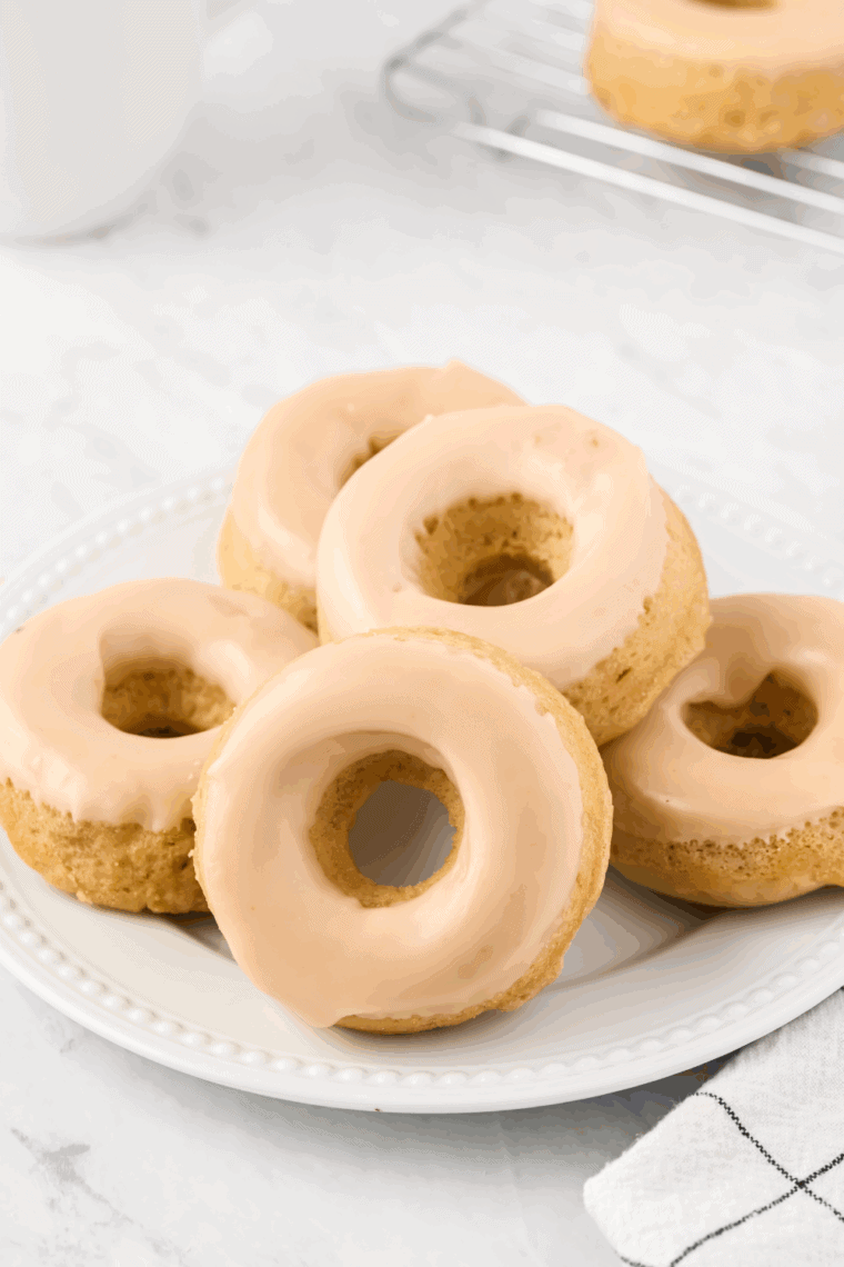 Soft and fluffy eggless donuts cooked in the air fryer with a lightly golden exterior.
