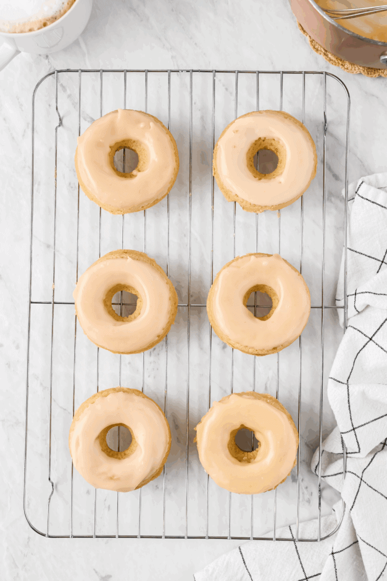 Freshly baked, golden eggless donuts made in the air fryer, soft and fluffy inside.