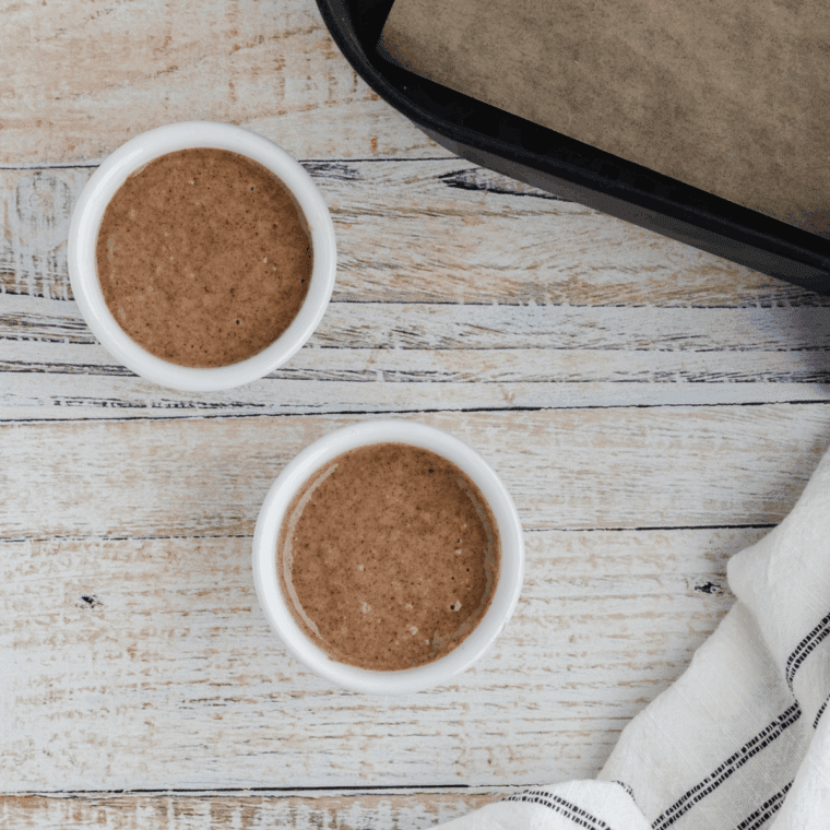 Pour the apple batter into oven safe mugs.
