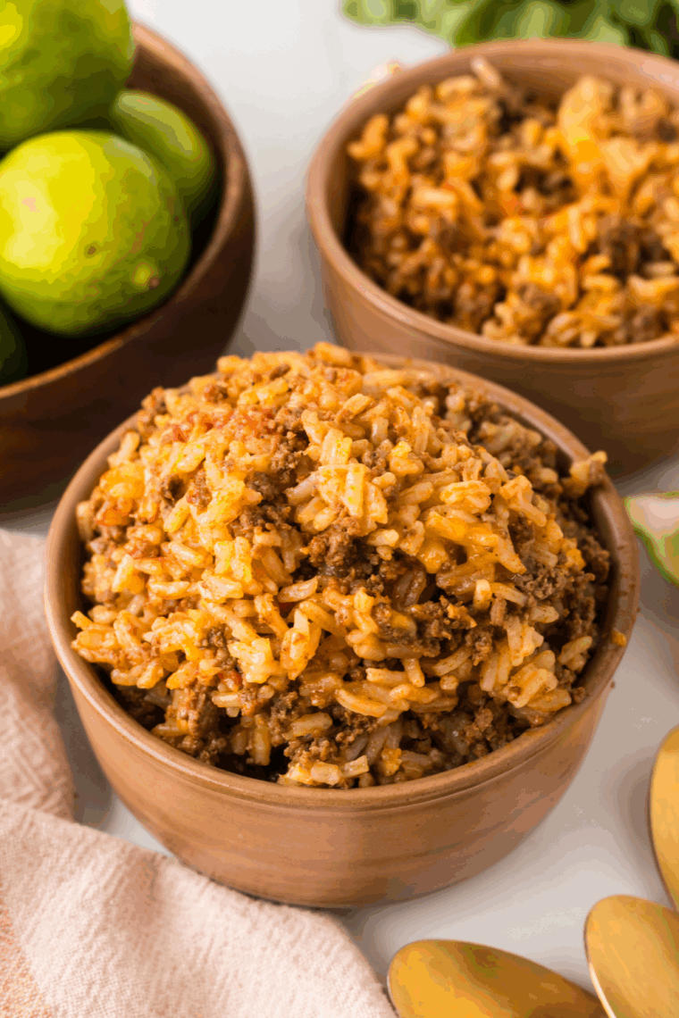 Close-up of a bowl of homemade Bojangles dirty rice with browned sausage and spices.