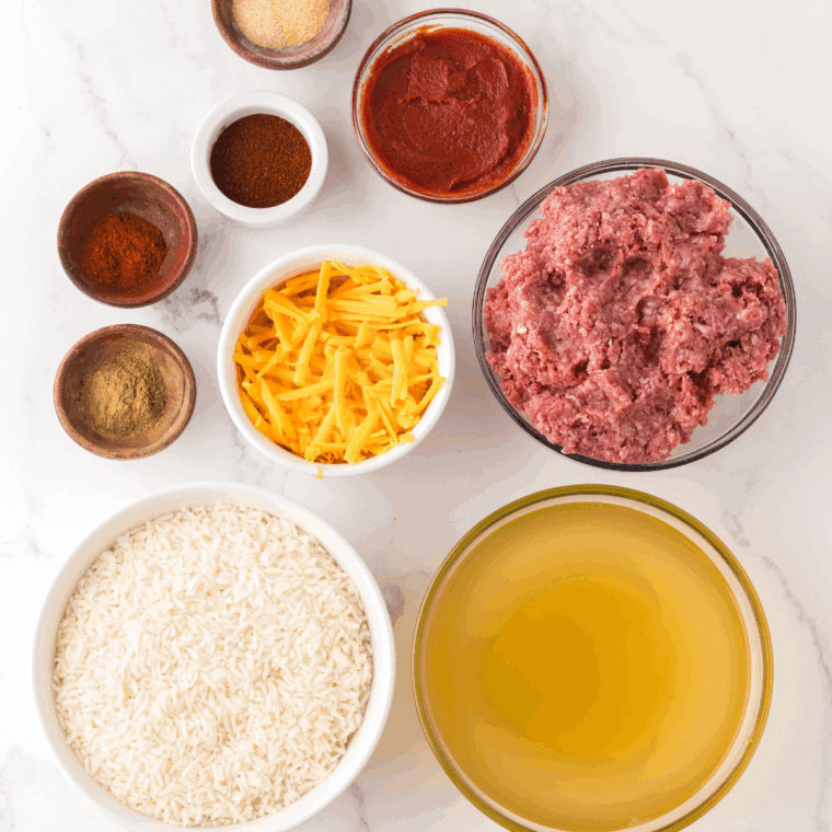 Ingredients needed for Easy Bojangles Dirty Rice Recipe on kitchen table.