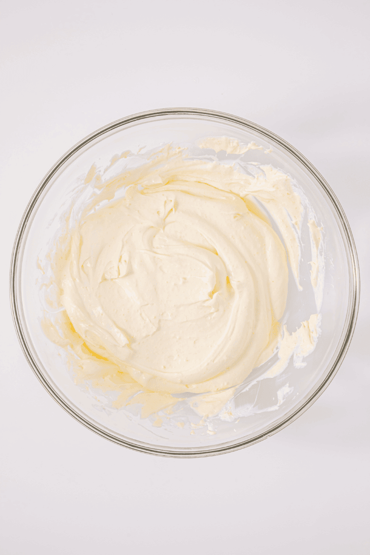 Whisk instant vanilla pudding mix with milk in a large bowl until smooth.