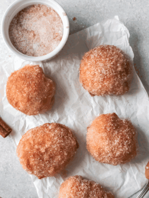 A plate of golden, fluffy homemade First Watch-style holey donuts ready to serve.