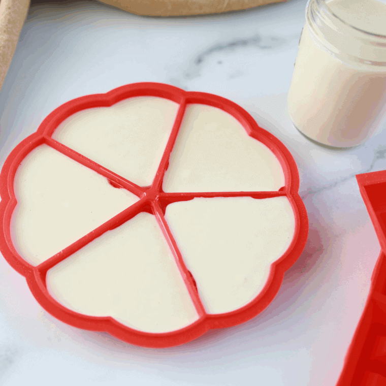 Grease waffle iron, pour batter, cook until golden, and serve w