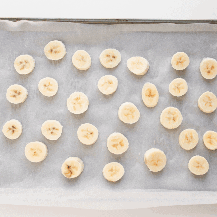 Slice bananas into &frac12;-inch rounds and arrange in a single layer on the sheet.