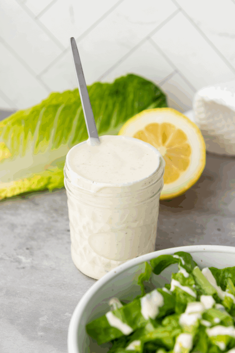 Homemade spicy Caesar dressing in a bowl, creamy and flavorful