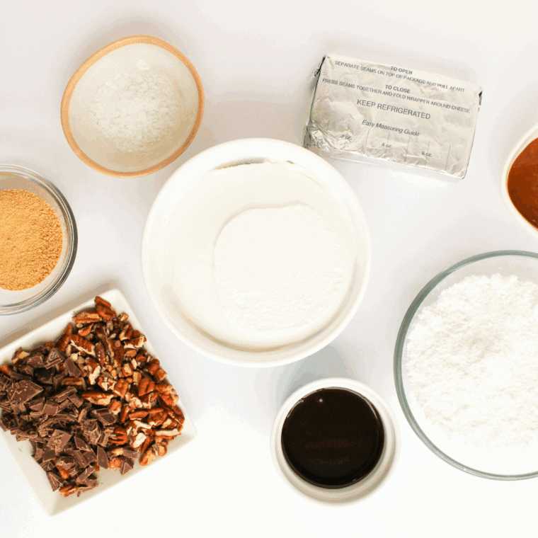 Ingredients needed for Easy Turtle Cheesecake Dip on kitchen table.
