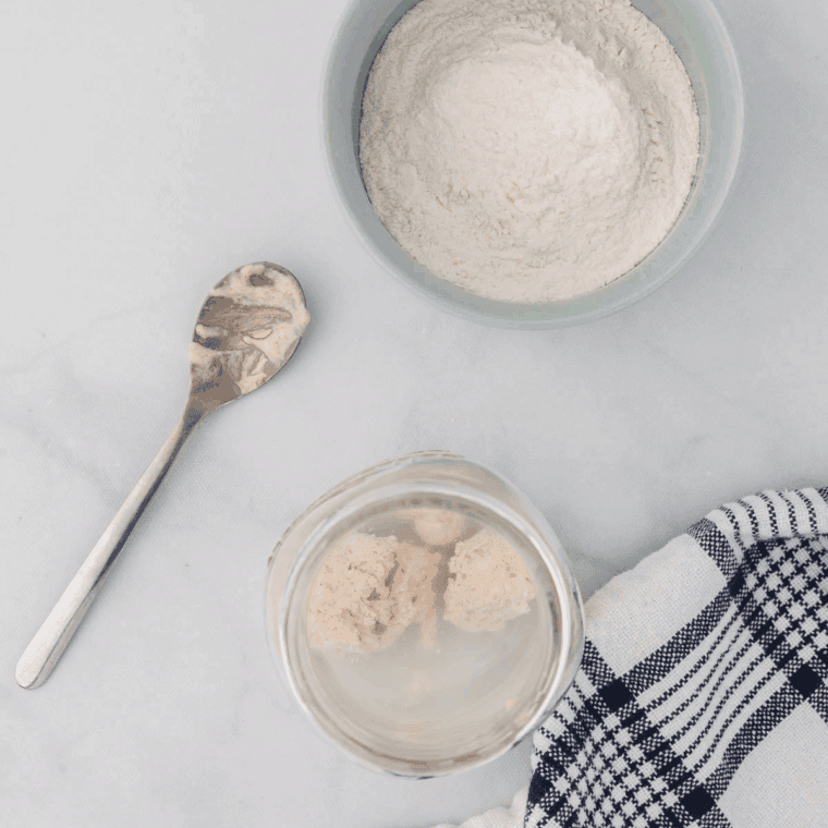 Adding sourdough discard, eggs, milk, and butter to batter