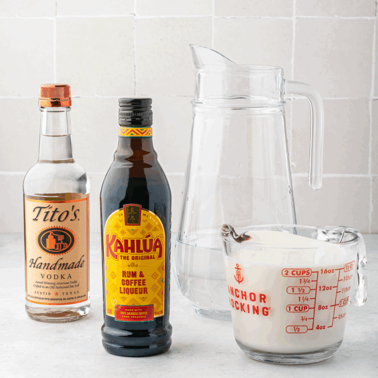 Ingredients needed for Ninja Slushi Frozen White Russian on kitcehn table.