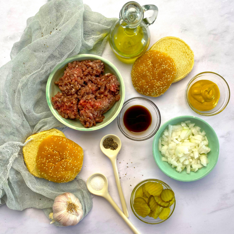 Ingredients needed for Best Copycat Maid Rite Recipe on kitchen table.