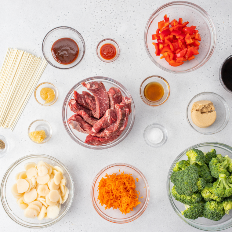 Ingredients needed for Easy Air Fryer Beef Lo Mein Recipe on kitchen table.