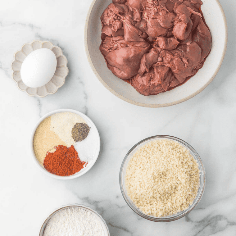 Ingredients needed for Easy Air Fryer Breaded Chicken Livers on kitchen table.