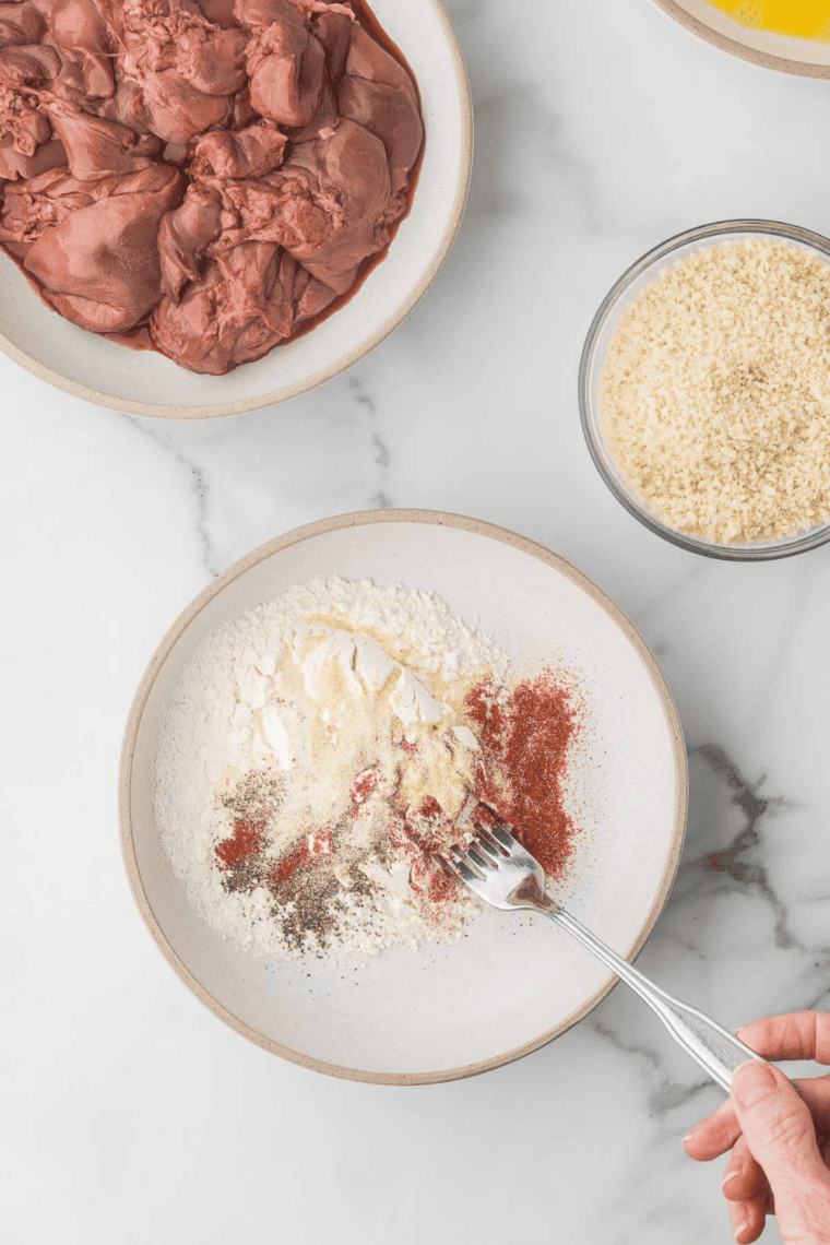 Raw chicken livers rinsed, patted dry, and trimmed of excess fat.