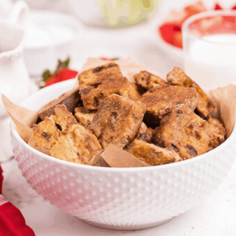 Air fryer French toast bites, golden and crispy, served with syrup