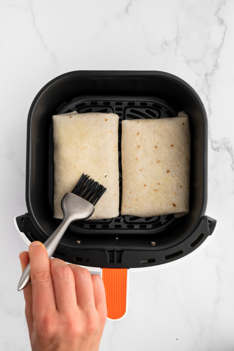 Brushed tortilla wrap with butter or olive oil for crispy golden finish.