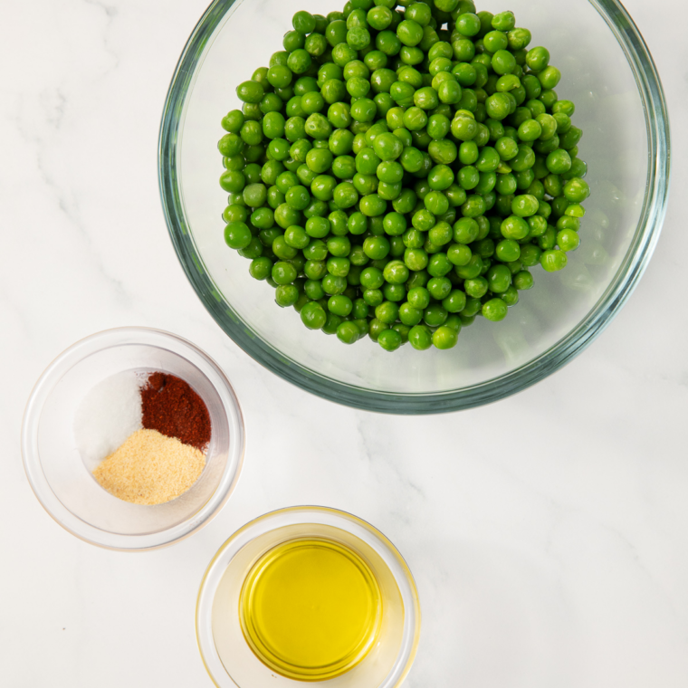 Ingredients needed for Easy Air Fryer Wasabi Peas on kitchen table.
