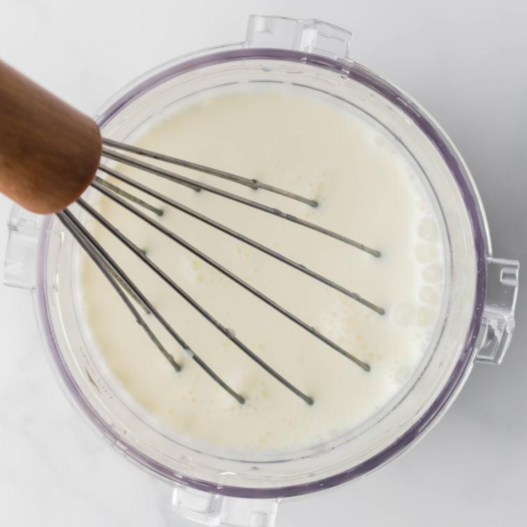 Milk, heavy cream, vanilla ice cream mix, and sugar blended smooth with cherries.