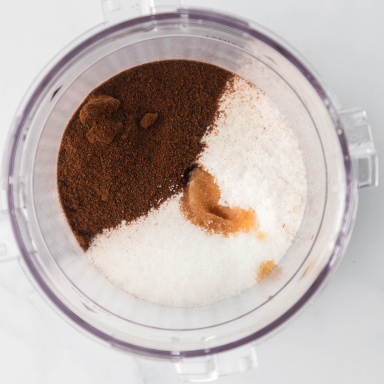 Whisking milk, cream, sugar, and espresso for coffee gelato base