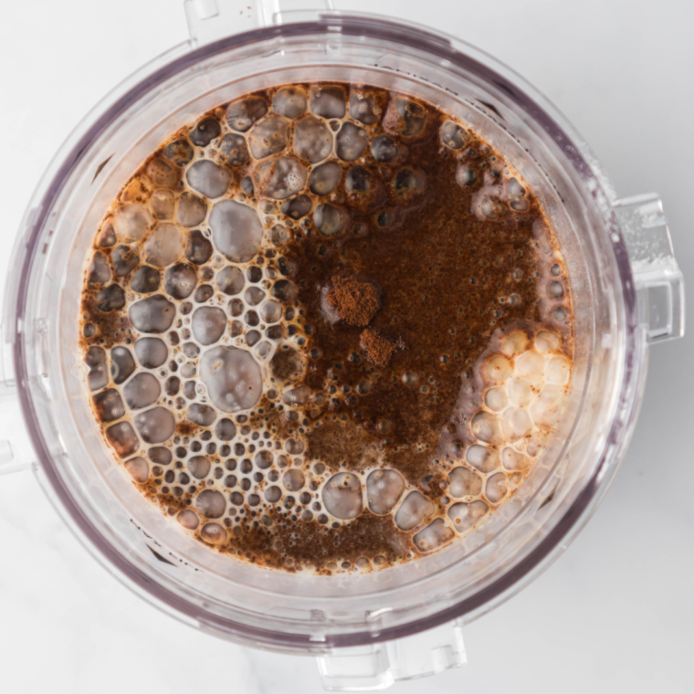 Ninja Creami pint container filled with coffee gelato mixture before freezing