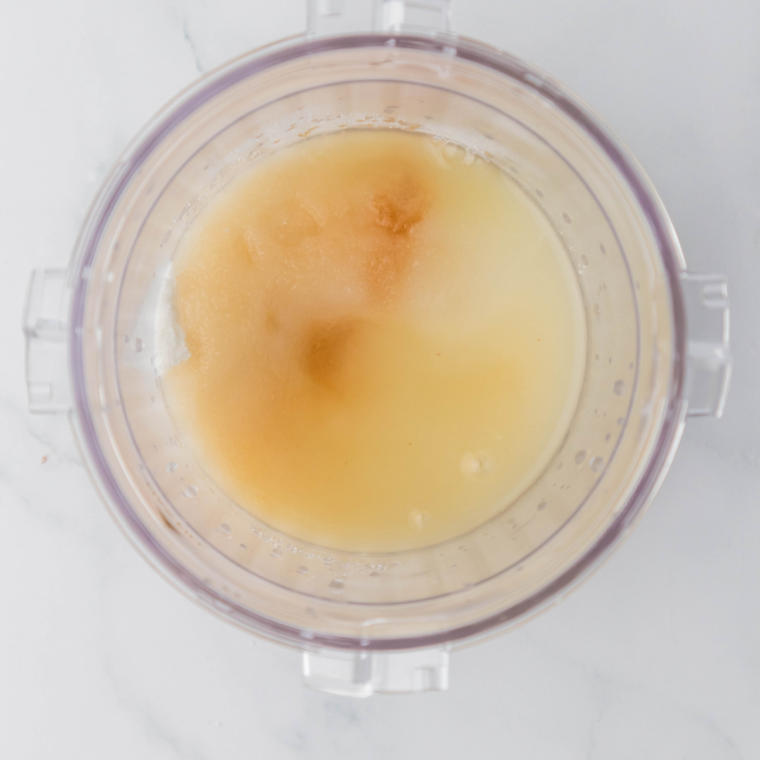 Mixing lemon gelato base ingredients in a bowl or Ninja Creami pint container