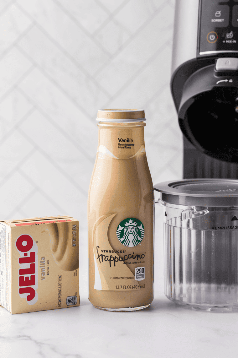 Ingredients needed for Easy Ninja Creami Starbucks Frappuccino Vanilla Iced Coffee on kitchen table.