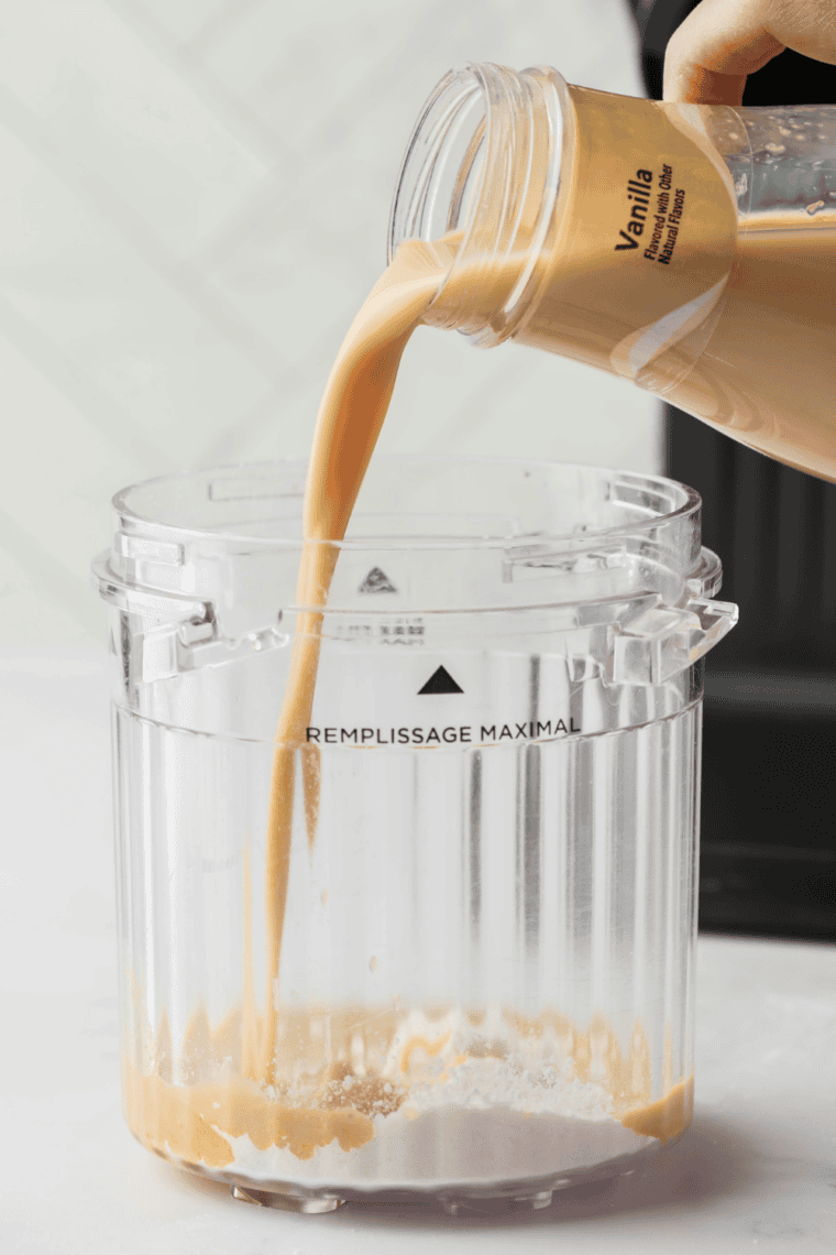 Mixing Starbucks Frappuccino Vanilla Iced Coffee with vanilla pudding mix in a bowl until smooth.