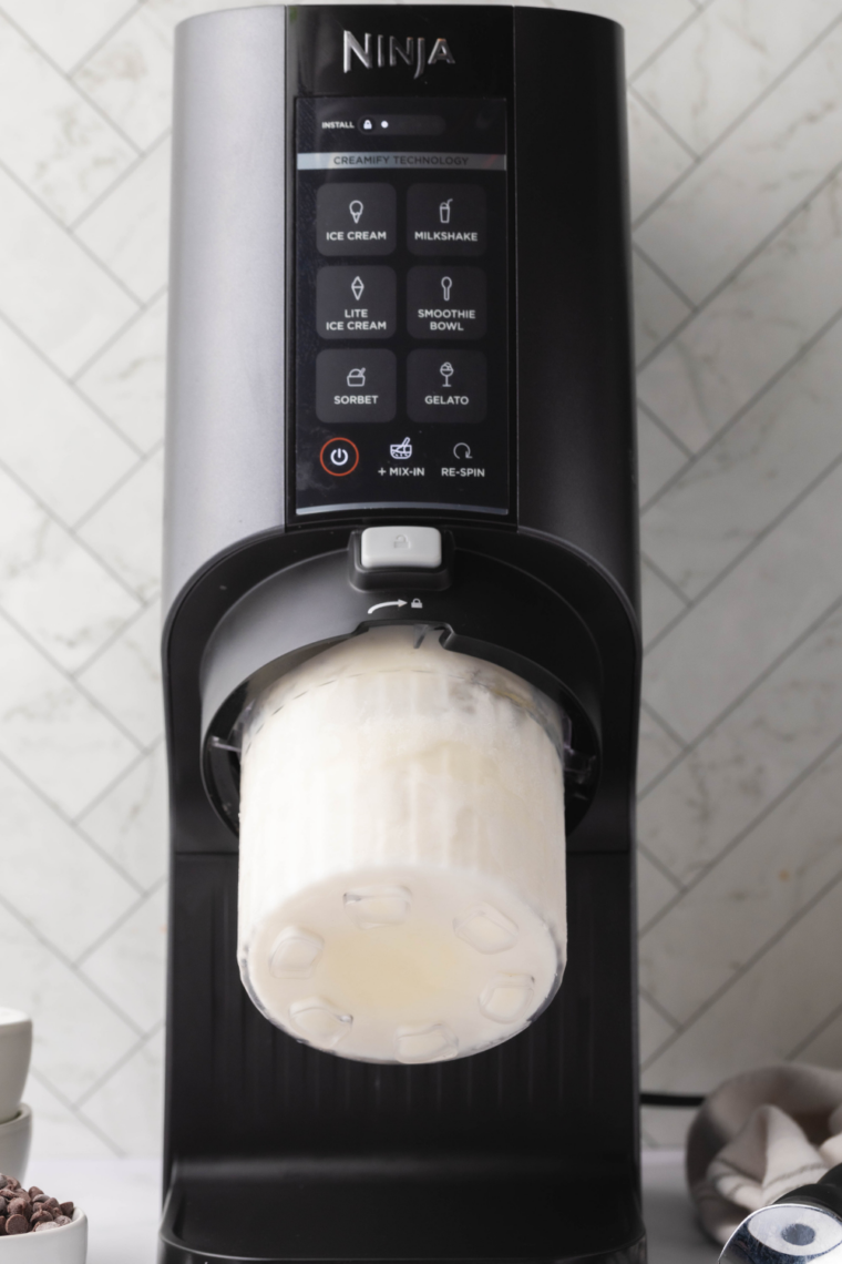 Ninja Creami pint container filled with gelato base ready to freeze.