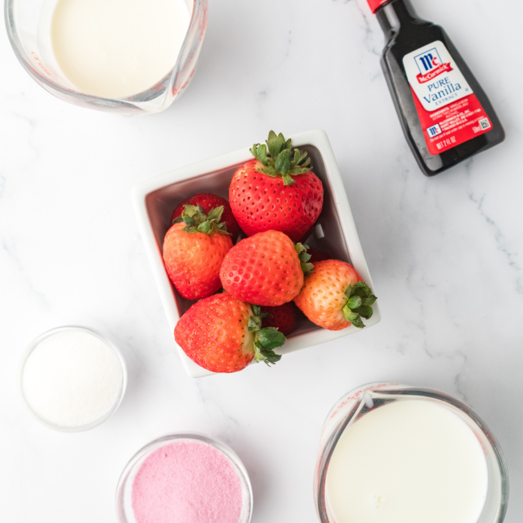 Ingredients needed for Easy Ninja Creami Strawberry Gelato on kitchen table.