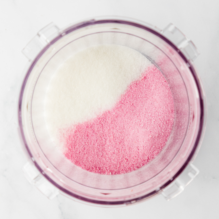 Milk, cream, sugar, and strawberry mix blended in a Ninja Creami pint container until smooth.