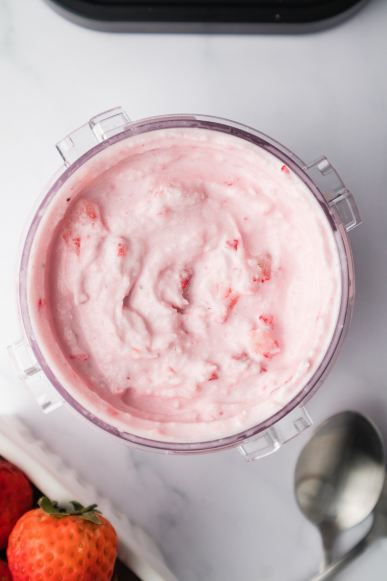 Creamy homemade strawberry gelato scooped into a bowl, made with fresh strawberries in the Ninja Creami.