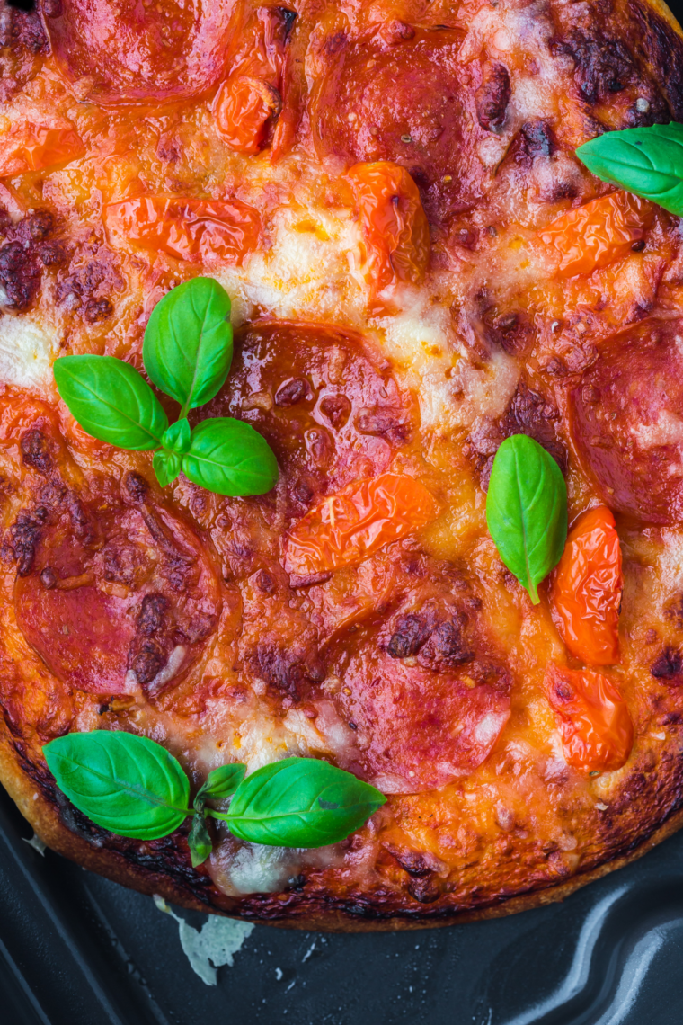 Serve and Enjoy &ndash; freshly baked woodfire-style pizza sliced and ready to serve.